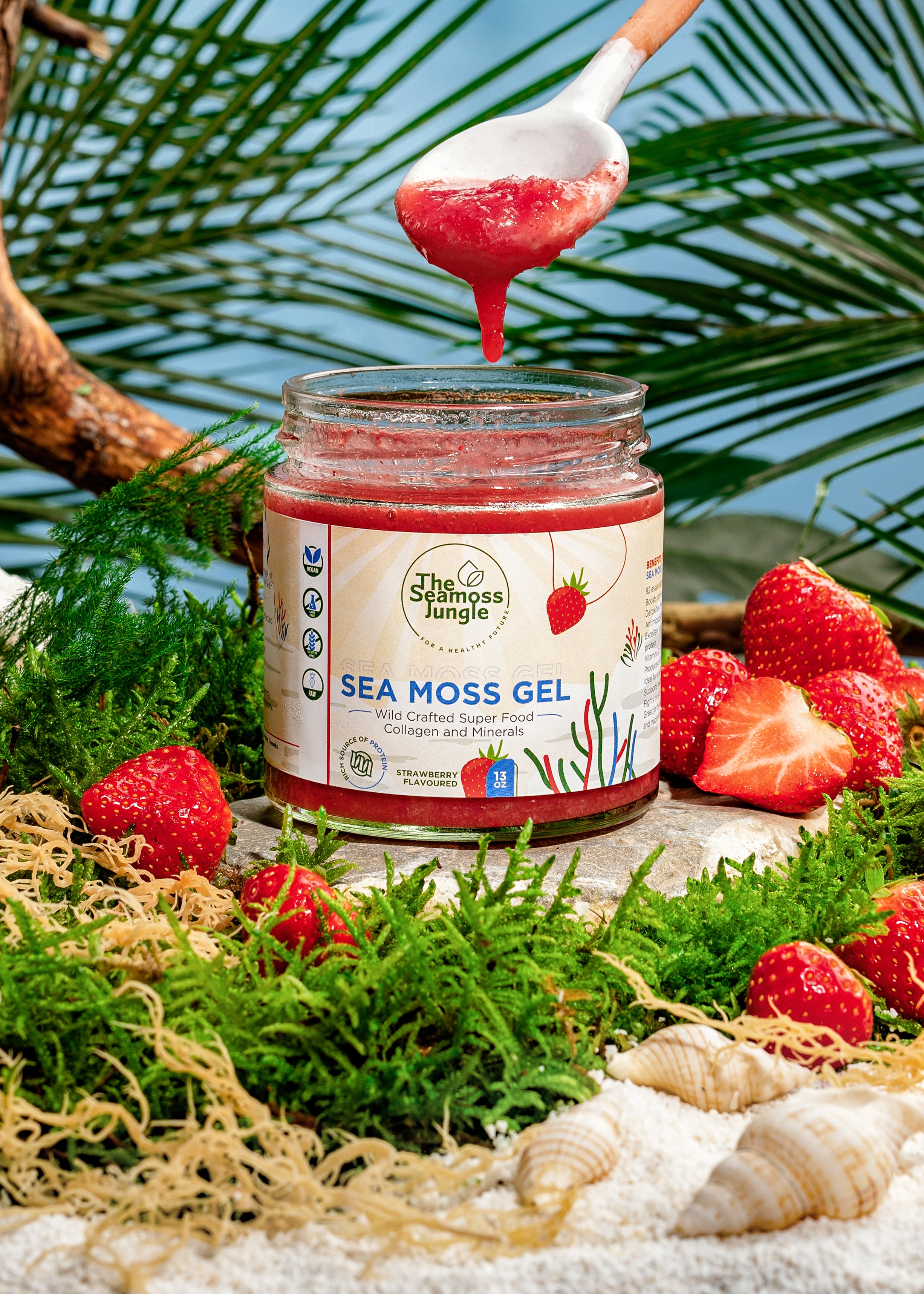 Geopende pot Sea Moss Gel met aardbeiensmaak.