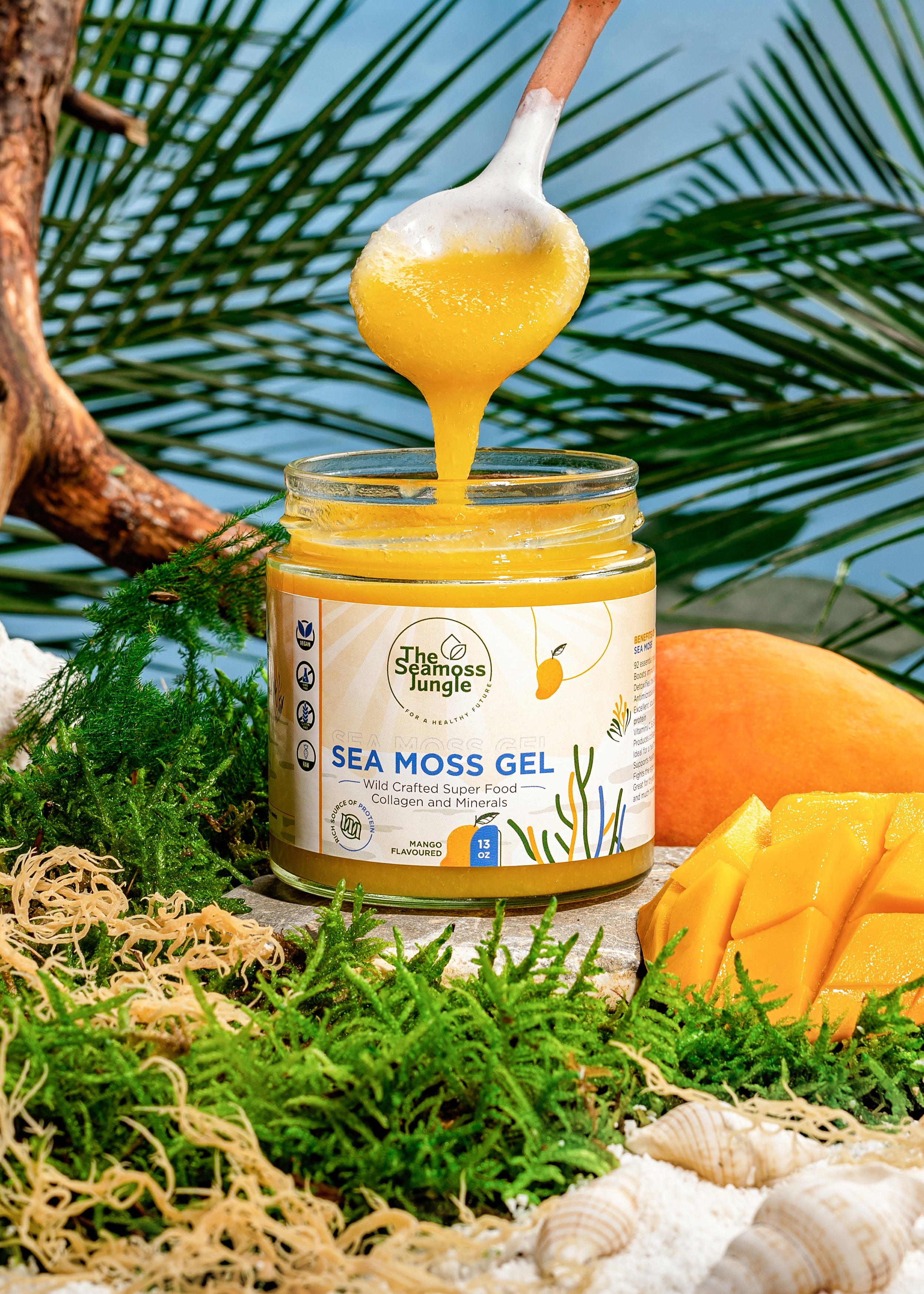 Geopende pot Sea Moss Gel met mango.